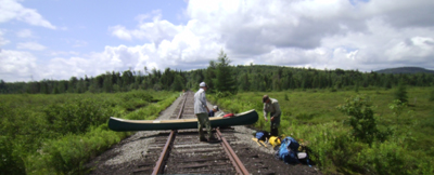 Canoe portage, down  rail road tracks.